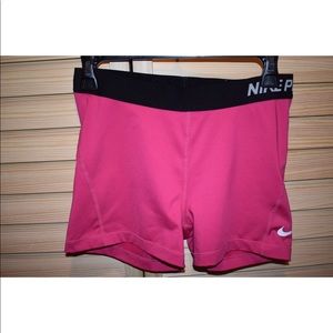 Pink Nike pro shorts women’s size large pink